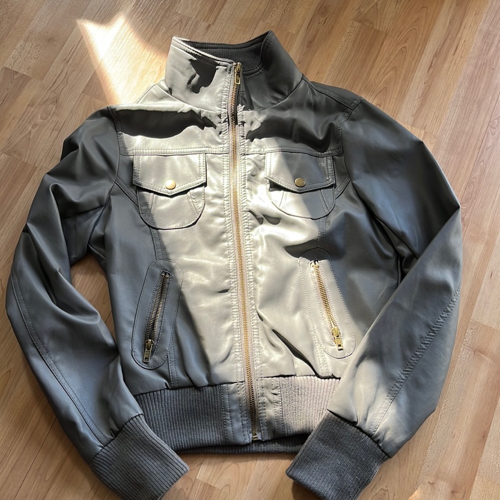 Never been worn. Vegan leather jacket. NWT